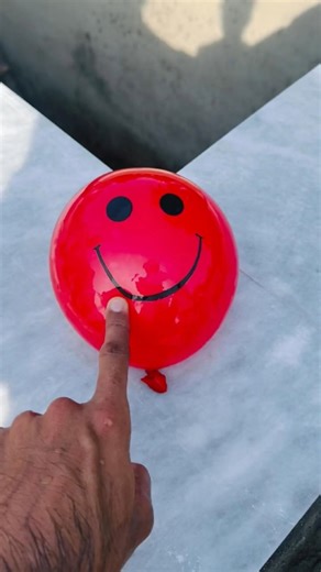 Experiment: Will a water balloon explode when it rolls down from a tall building? 💥🎈 #balloon