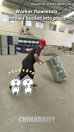 Worker flawlessly throws bucket into place
