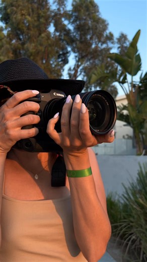 1.5K views · 20 reactions | She didn’t expect how her photos would look through the AURORA ORANGE Filter. Portraits turned into warm, glowing reflections — cinematic light straight from the sun. ✅ Fits all camera brands | ReflectLens | Facebook