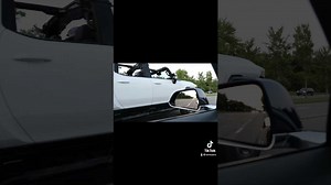 Watch Tesla Model 3 Race GMC Hummer EV Prototype