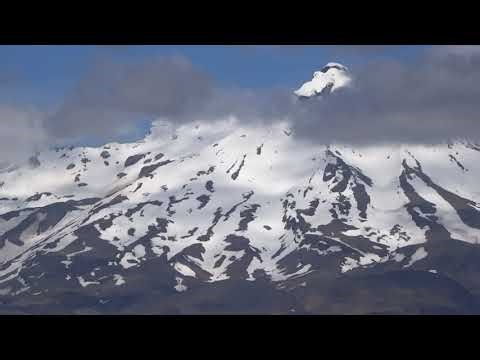 Snow-Covered Volcanos in the North - Island of NZ