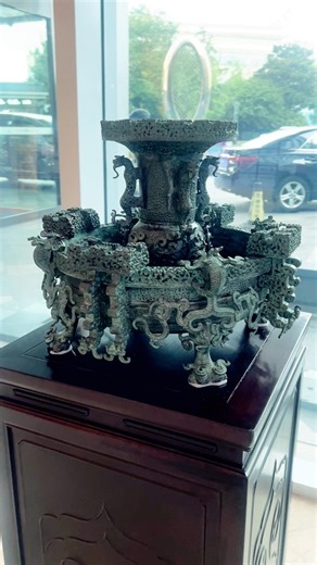 The Zeng Hou Yi Ritual Vessel is a bronze artifact from the Eastern Zhou Dynasty, some 2,400 years ago, created for the Marquis Yi of the Zeng State. Reportedly discovered in 1978, this vessel demonstrates ancient ingenuity in managing seasonal temperatures. During winter, the tray could hold hot water to warm the wine within the vessel, ensuring a comfortable temperature for the drink. Conversely, in summer, the tray could be filled with ice to chill the wine, providing a refreshing coolness. T