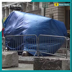 New York’s iconic ‘Charging Bull’ statue has been covered with a tarp as a cautionary measure against potential vandalism over the GameStop frenzy. | TRT World