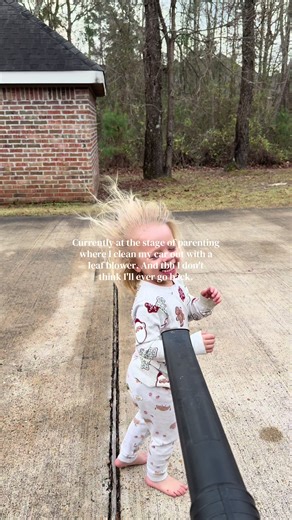 Unique Parenting Style: Cleaning with a Leaf Blower
