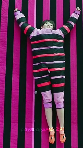 Energetic Fun at the Trampoline Park in Striped Jumpsuit