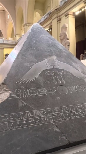 Black Pyramid Fragment in the Egyptian Museum 🏛️ Carved from deep black stone, this fragment once crowned the Black Pyramid at Dahshur. Marked with the Eye of Ra and the Eye of Horus, it was meant to protect the king, guide his soul toward the sun, and ensure balance and rebirth in the afterlife. A spiritual guardian placed at the highest poin, where earth meets eternity. #egypt #ancientegypt #visitegypt #karofttours #egyptoura | Egypt Karoft Tours