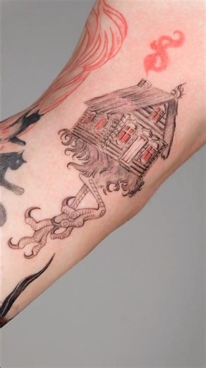 A tattoo on my arm depicts a hut on chicken legs. A beautiful, stylish tattoo by @kottattoostudio.