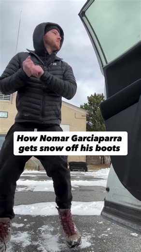 Nomar Garciaparra getting snow off his boots #bostonsbigfour #redsox #boston #newengland #nomargarciaparra