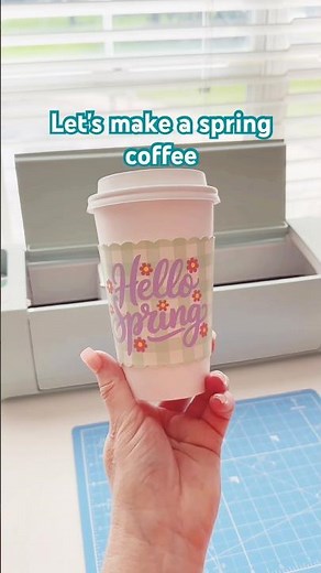 Let’s make a spring coffee cup sleeve using faux leather, heat transfer vinyl and a Cricut!
