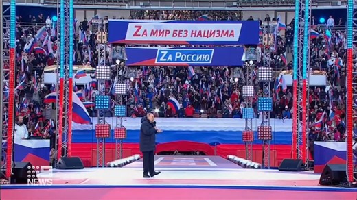 Vladimir Putin appears at rally