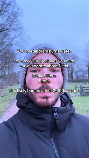 Most people think metabolism is just about calories or body fat. But here’s a cool physiological fact: You don’t just burn calories. You burn water. When your cells oxidize glucose and fat to produce ATP, they generate carbon dioxide, heat; and metabolic water. At normal temperature and humidity, a person evaporates roughly 1 liter of water for every ~1,000 calories metabolized through respiration and skin evaporation. That means water turnover reflects metabolic rate. If you drink 3 liters of f