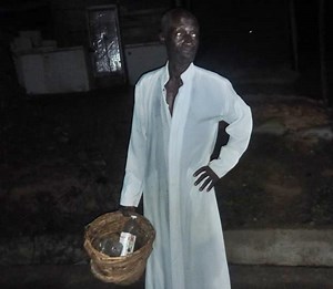 Church Member Flees As Pastor Is Caught Bathing Him Inside A Basket At Night (Photos/Video)