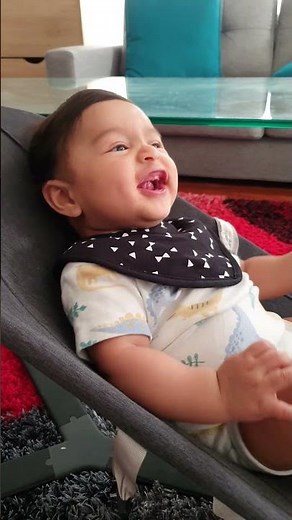 Baby eating banana for the first time 😋