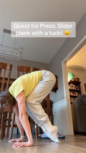 Slider plank — with a tuck! This is tough! 😩