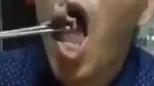 Foul moment Chinese man eats mice alive