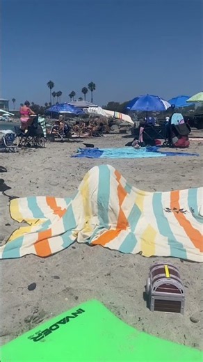 Who is under the beach tent?