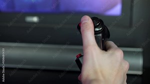 Air force simulation of a fighter jet control stick in cockpit.