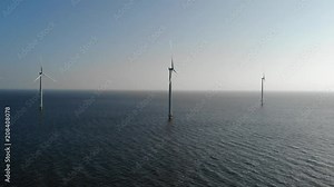 Windmill park offshore and onshore in the Netherlands, huge windmill farm at the Noordoostpolder Flevoland