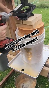 11M views · 16K reactions | Apple cider pressing with a scissor jack and 3/8ths impact Not my preferred method but it works. Debris is next to nothing and we filter before canning. This is from 2024 Full apple pressing videos on my youtube https://youtu.be/0r-VSwuYShE Www.housemercantile.com #house_mercantile #smallshop#woodworking #homesteading #applepress | House_mercantile | Facebook