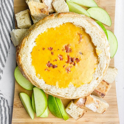 197K views · 227 reactions | CHEDDAR BEER FONDUE is a hot, cheesy dip with bacon that is perfect for dunking! Recipe here: https://www.recipegirl.com/cheddar-beer-fondue/ | RecipeGirl | Facebook