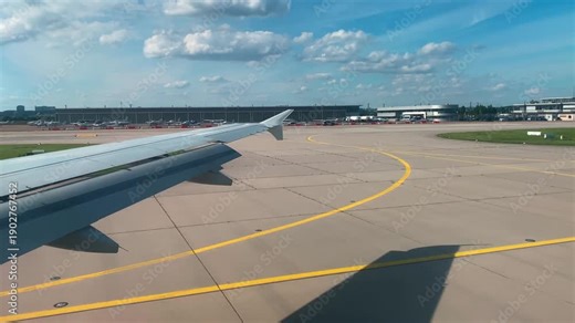 Airplane Window View Over Fields and Cities During Landing Approach