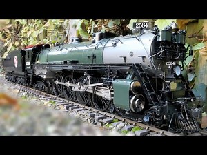 ASTER Live Steam Gauge 1 Great Northern S2 4-8-4 with an MTH and ASTER Freight Train in the Garden