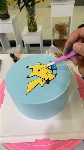 The pattern can be transferred to the cake by drawing with line paste and baking in a low