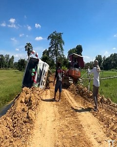 2.6M views · 11K reactions | Unbelievable Dump Truck Rescue! Excavator Skillfully Saves Tipping Trucks on the Edge | Dozer Tv | Facebook