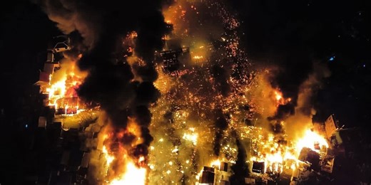 Philippines fire: Huge inferno reduces village to ruins as orange flames and billows of smoke soar into Filipino skies