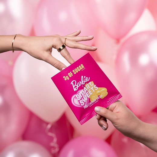 The sweet taste of nostalgia 💖🛼 Celebrating 65 years of Barbie by teaming up with our favorite female founded brands – like SmartSweets! Shop the candy of our daydreams with the limited time #Barbie x SmartSweets Pink Lemonade Dream Gummies now. bit.ly/pink-lemonade-dream-barbie | Barbie