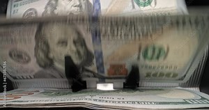 Money cash counting equipment. Counting money on bank automatic equipment. Closeup modern automatic equipment for counting cash money. Bank automatic equipment for counting paper money. Business