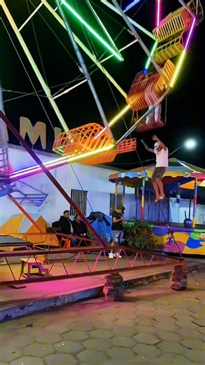 Roller coasters, theme parks and thrill rides don’t always rely on automation. These ferris wheel operators flip passenger cars by hand, turning a classic amusement park ride into a real thrill seeker experience. Would you trust this ride operator? Share & follow CoasterRaccoon. #rollercoaster #themepark #thrillrides | Coaster Raccoon