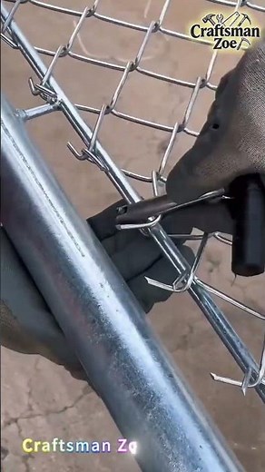 Workers install the steel wire mesh and the guard net column together