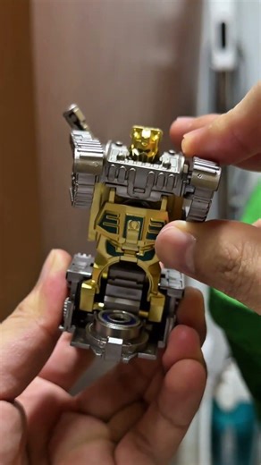 Wow, I bought this transforming tank spinner robot for under $1!