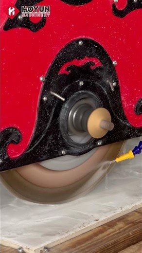 How to use a bridge cutting machine to process a stone dining table with rounded corners.