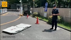 4.6K views · 107 reactions | The valet robot is a low, extendable cart with grippers for the wheels. It drives under the bottom and pushes the grips under the wheels. Police in China do re-parking to the nearest legal parking space, instead of towing the vehicle illegally parked. Video Credit: Massimo #technology #engineering #valet #parking #robotics | Wevolver.com | Facebook