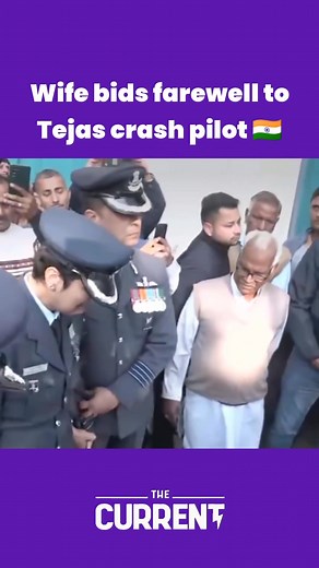 Wing Commander Afshan of the Indian Air Force (IAF) bids farewell to her husband, Wing Commander Namansh Syal, who was killed in the Tejas jet crash at the Dubai Air Show. The crash on Friday sparked widespread condolences from around the globe, including Pakistan. | The Current