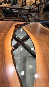 *Crafted to impress. Designed to last.* This stunning 210×100 cm (approximately 82.7×39.4 inches) table blends the richness of walnut wood with crystal-clear epoxy for a modern yet timeless statement piece. Perfect for homes that crave natural beauty with a touch of sophistication. ✨ Handmade with passion 🌳 Premium walnut wood 💎 Crystal clear epoxy finish #diningtable #epoxytable #handmade #resinart | Gül Natural Furniture