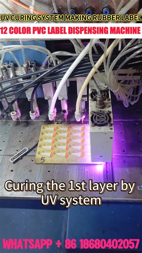 How To Use UV Curing System Making Soft PVC Patch in Rubber Label In Turkey Plastic Factory In this video, we showcase the incredible capabilities of our automatic label dispenser, demonstrating how to make colorful labels efficiently. With expert tips and step-by-step guidance, you'll see how this automatic pvc label dispensing machine with UV lamp to create vibrant designs. 🎨✨ Contact me : Whatsapp Me：https://shorturl.at/3oVSS Business Email : sandyht@163.com Let's Connect Facebook : https://