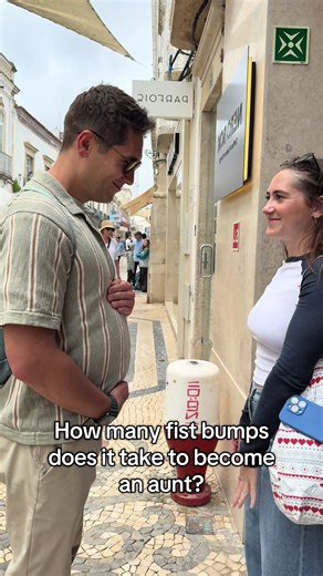 Fist Bumps: A Special Bond Between Twins and Dads