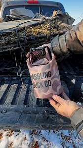 Tired of having loose shells all over the place? Keep yours secured, dry, and readily available with our shell pouch. Comes with a handle, two D rings, a clip, and a carrying strap. Get yours today! | Dabbling Duck Co.