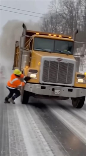 Construction worker stops runaway truck