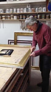 The Art of Gilding a Frame (Part 2) Burnishing the gold leaf. This is where an agate burnishing tool is used to polish the matt leaf to give a glimmering look that can resemble a gold bar. It's a pretty laborious process that on a large frame like this can take about 1 hour, however it's well worth the effort as the transformation is spectacular. | Art Hire Framing