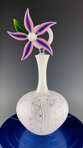 “Pinwheel” new vessel now up in the Etsy shop! 🌸 https://evolvingcreations.etsy.com/listing/1895129083 #glassart #vessels #zanfirico #latticino #flowers #spring #smallbusiness #evolvingcreationslampwork | Beau Barrett