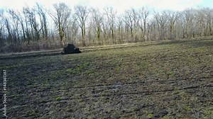 UTV off road four wheel drive sport car driving up the hill to the creek. 4K Video