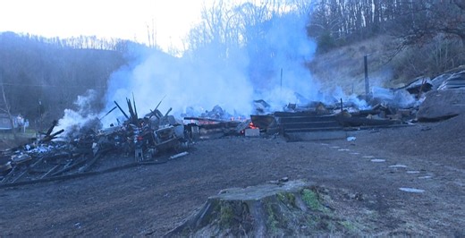 More than 100-year-old home goes up in flames; teen helps rescue owner