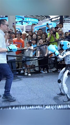 Left jabs, right hooks... the World Robot Conference came alive with an electrifying robot fighting competition! #robot #fighting (cr: douyin renminwang) | T-Time HK