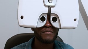 Free stock video - Man doing eye test