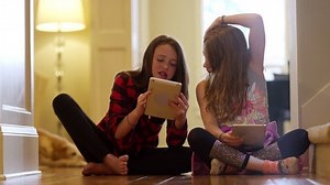 Two Friends Sitting Together Hallway Using Stock Footage Video (100% Royalty-free) 16070620 | Shutterstock