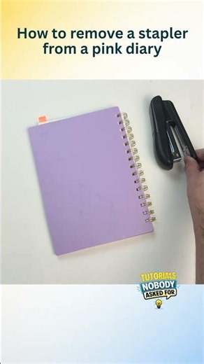 How to remove a stapler from a pink diary